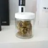 420 glass jar with cannabis in it